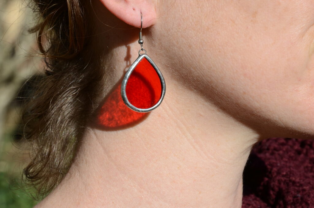 Boucles d'oreilles orange Fait de Verre
